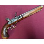Flintlock pistol with 10 1/4 inch heavy octagonal barrel with brass inset fore and aft sights,