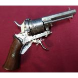 Belgium 7mm pinfire 6 shot revolver with 3 inch octagonal barrel, two piece wooden grips and folding