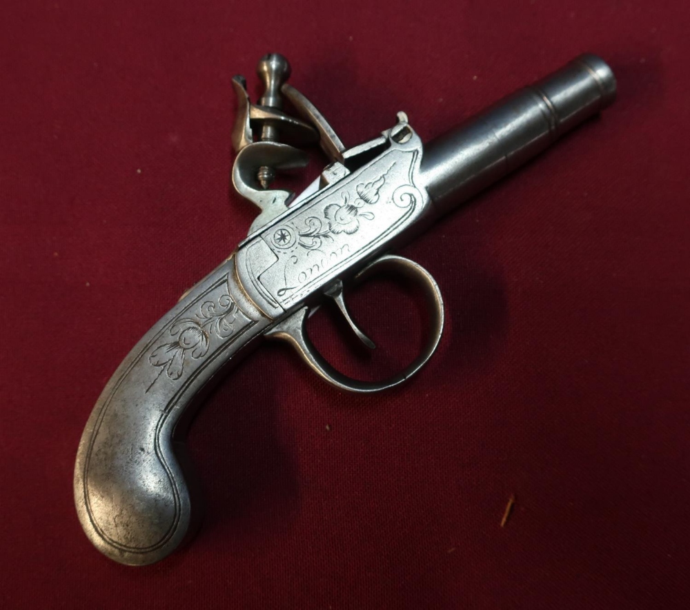 18th/19th C all steel bodied flint lock pocket pistol, with 1 1/4 inch turn off rifle canon