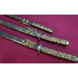 Set of three decorative graduating samurai style swords