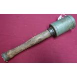 Inert German stick grenade with belt clip and wooden handle, complete with screw off cap stamped