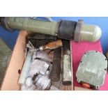 Box containing a selection of various assorted inert and training aids, fuse boxes, grenade casings,