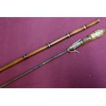 19th/20th C bamboo style sword cane with 13 1/2 inch square formed blade