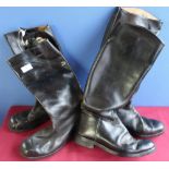 Two pairs of military style black leather high boots