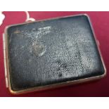 German rectangular white metal and gilt lined leather bound cigarette case with traces of eagle