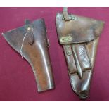 Swedish leather pistol holster and a 1916 leather Webley service revolver holster marked NGR.1916 (