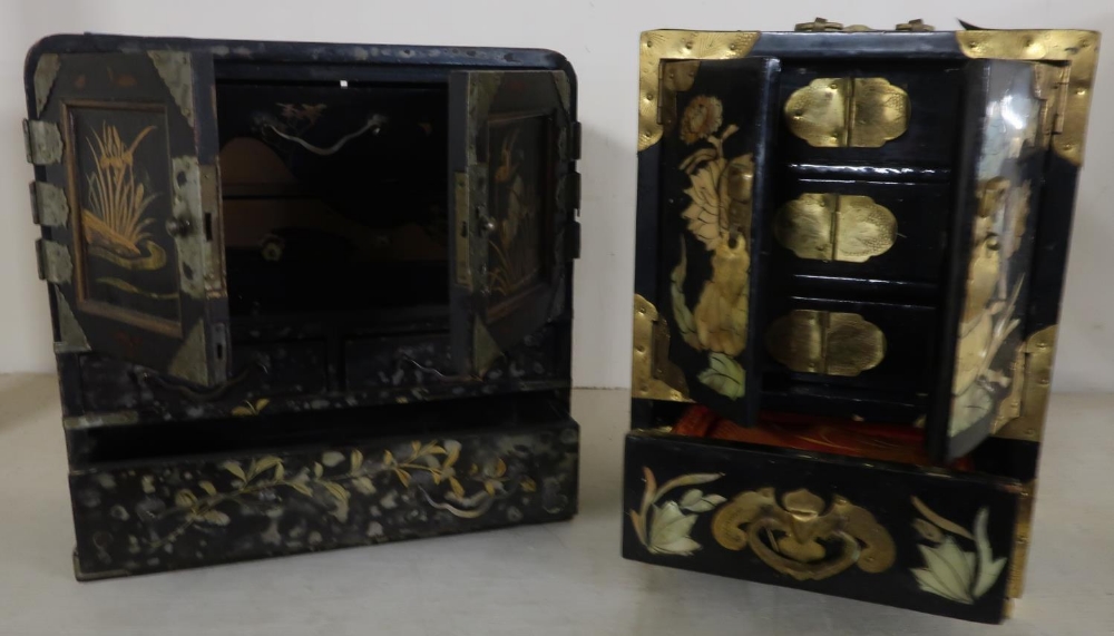 Early to mid 20th C Japanese lacquered table cabinet with two panelled doors revealing two drawers - Image 2 of 2