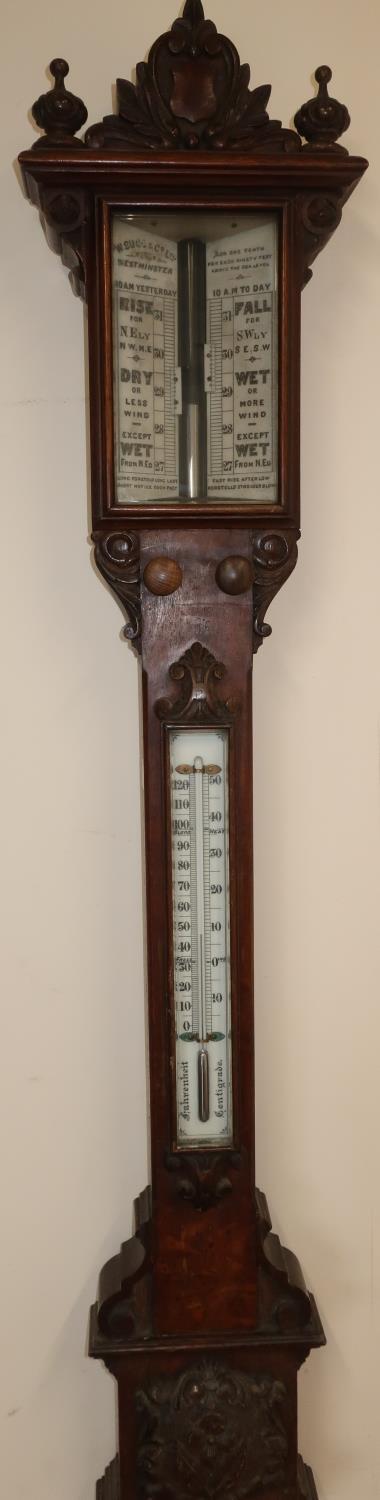 W. Sugg & Co Ltd Westminster oak cased stick barometer with carved detail (length 110cm)