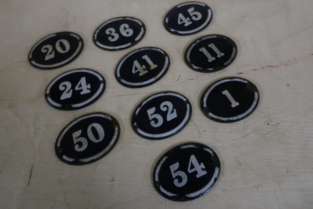 Set of ten blue and white enamel numbers, various numbers ranging from 1 - 54