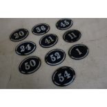 Set of ten blue and white enamel numbers, various numbers ranging from 1 - 54