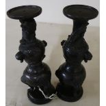 Pair of 19th C Meiji period Chinese bronze stands on circular bases (height 22.5cm)