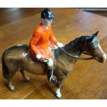 Beswick figure of a huntsman on chestnut horse