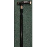 Ebonised walking cane with silver hallmarked collar and mounts