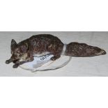 Small cold painted bronze figure of a fox (length 6.5cm)