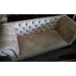 Modern Victorian style small two seat settee with deep button backed upholstery on turned