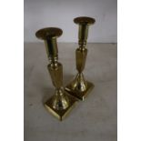 Pair of early 19th C brass candlesticks on square bases (height 25cm)