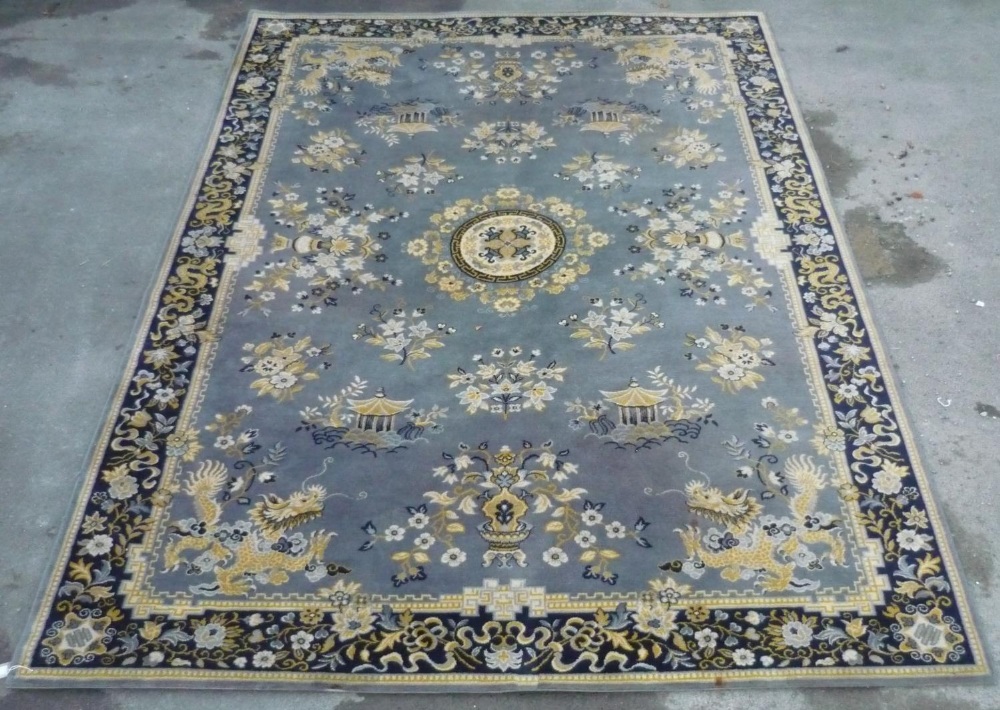 Oriental pattern wool rug, grey ground with floral pattern border (202cm x 297cm)