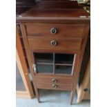 Edwardian mahogany music cabinet with two fall front drawers above glazed cupboard door and two