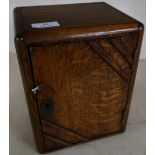 Small Art Deco oak table top smokers type cabinet with hinged door and fitted interior (20cm x
