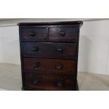 Early 19th C apprentice piece miniature mahogany chest of two short above three long drawers (