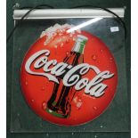 Illuminated Coca-Cola advertising sign