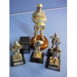 Large silver plated statuette of an American c.WWII paratrooper and a group of four silver plated