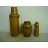 Edwardian turned beech-wood bottle holder containing a clear glass bottle with cork stopper, a