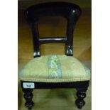 Miniature Victorian mahogany chair with upholstered seat and turned supports (38cm high)