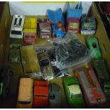 Box containing a quantity of various Dinky die-cast vehicles including various spare tyres, Dinky