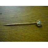 A cased 14ct gold gold and seed pearl stock pin