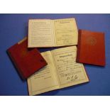 Group of four German Third Reich Labour Corp pass books with various stamped markings, date mid