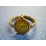 Circa 1920s ladies 9ct gold cased wristwatch with expanding plated strap