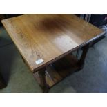Quality oak two tier occasional table on turned supports (60cm x 60cm x 50cm)