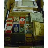 A box containing various vintage cigarette boxes including Woodbine, Craven A, Players etc,