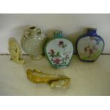Three Chinese porcelain/ceramic scent/opium bottles, and two carved hard-stone figures one of a
