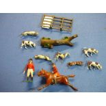 Britains painted lead figure hunting group comprising of huntsman, fence, log, hunt footman,