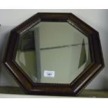 1930s oak octagonal framed bevelled edge wall mirror (39cm x 39cm)
