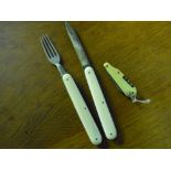 German made pocket knife with folding blade and matching folding fork with ivory grips, and a