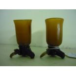 Pair of unusual stirrup cups with cast metal bulls head bases and cows horn cups (6cm high)