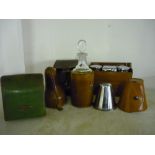Collection of leather cased travelling items including circa 1920s glass decanter, cup set, dressing