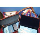 Collection of various masonic regalia, including two tan leather cases, various masonic related