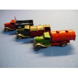 Three tin-plate clockwork Tri-ang Mimic trucks including dustcart, flatbed and tanker