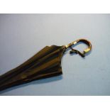 Edwardian black umbrella with 18ct gold plated collar and embossed yellow metal cap