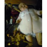 Circa 1950s doll, two slingshots, a Pelham puppet etc