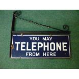 Double sided blue & white enamel 'You May Telephone From Here' sign with later wall mounting bracket