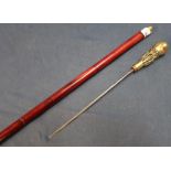 Malacca walking sword cane with brass handle in the form of a Chinese Sage