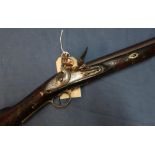 Flintlock carbine, 16 inch barrel with worn proof marks, complete with swivel stirrup ramrod and