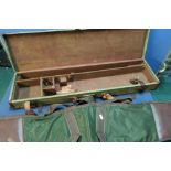 Vintage canvas and leather trim gun case to fit up to 31 inch barrels, and a modern gun slip (2)