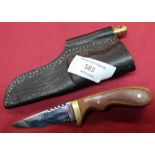 Sheffield made sheath knife with 2 3/4 inch blade, brass cross piece and leather sheath, with
