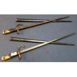 Two 19th C French Gras type bayonets with board top straps with engraved details and dates 1877